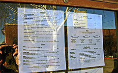 restaurant menu in window